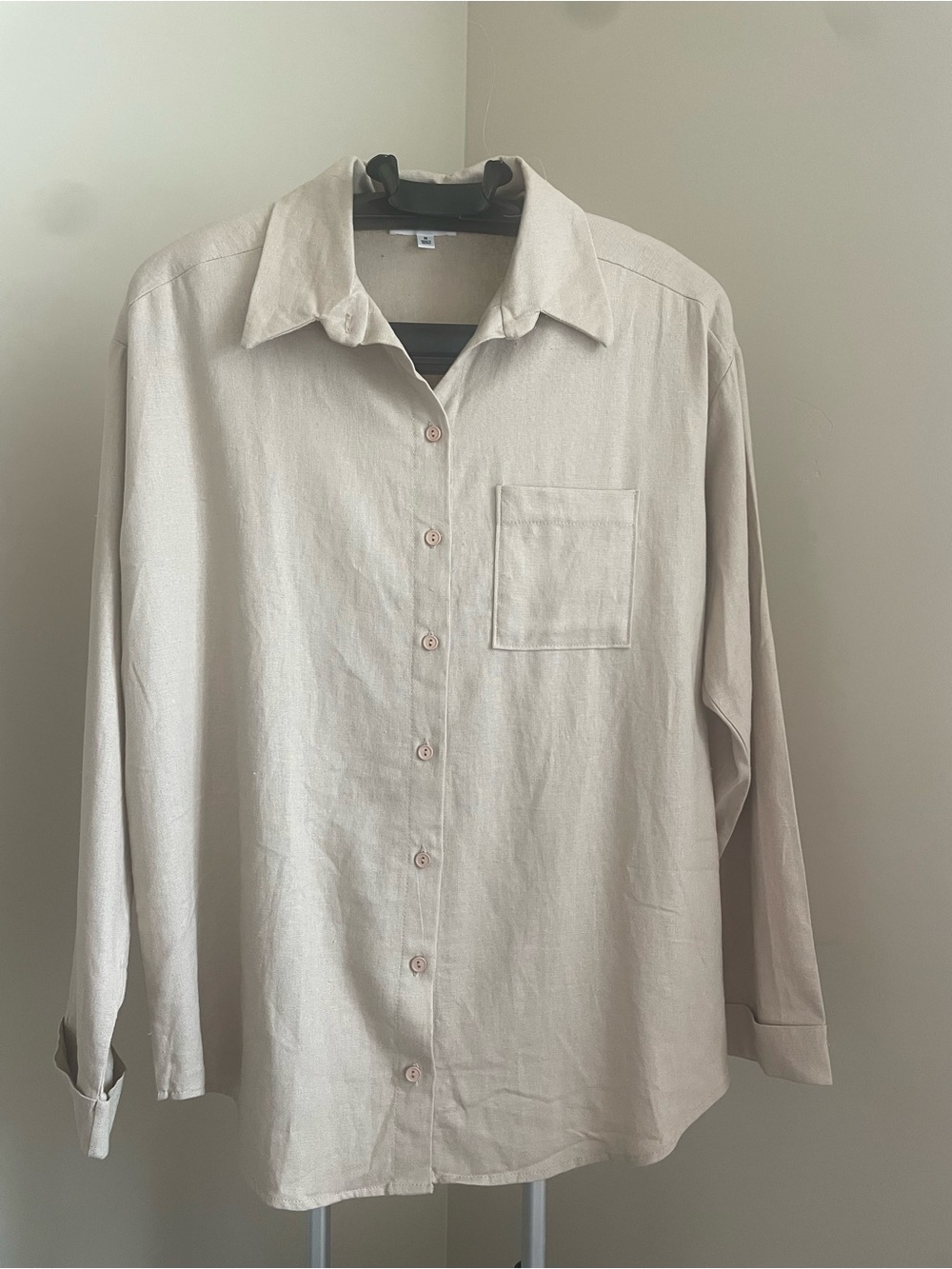 Women’s Classic Long-Sleeve Button-Up Shirt in Light Beige.